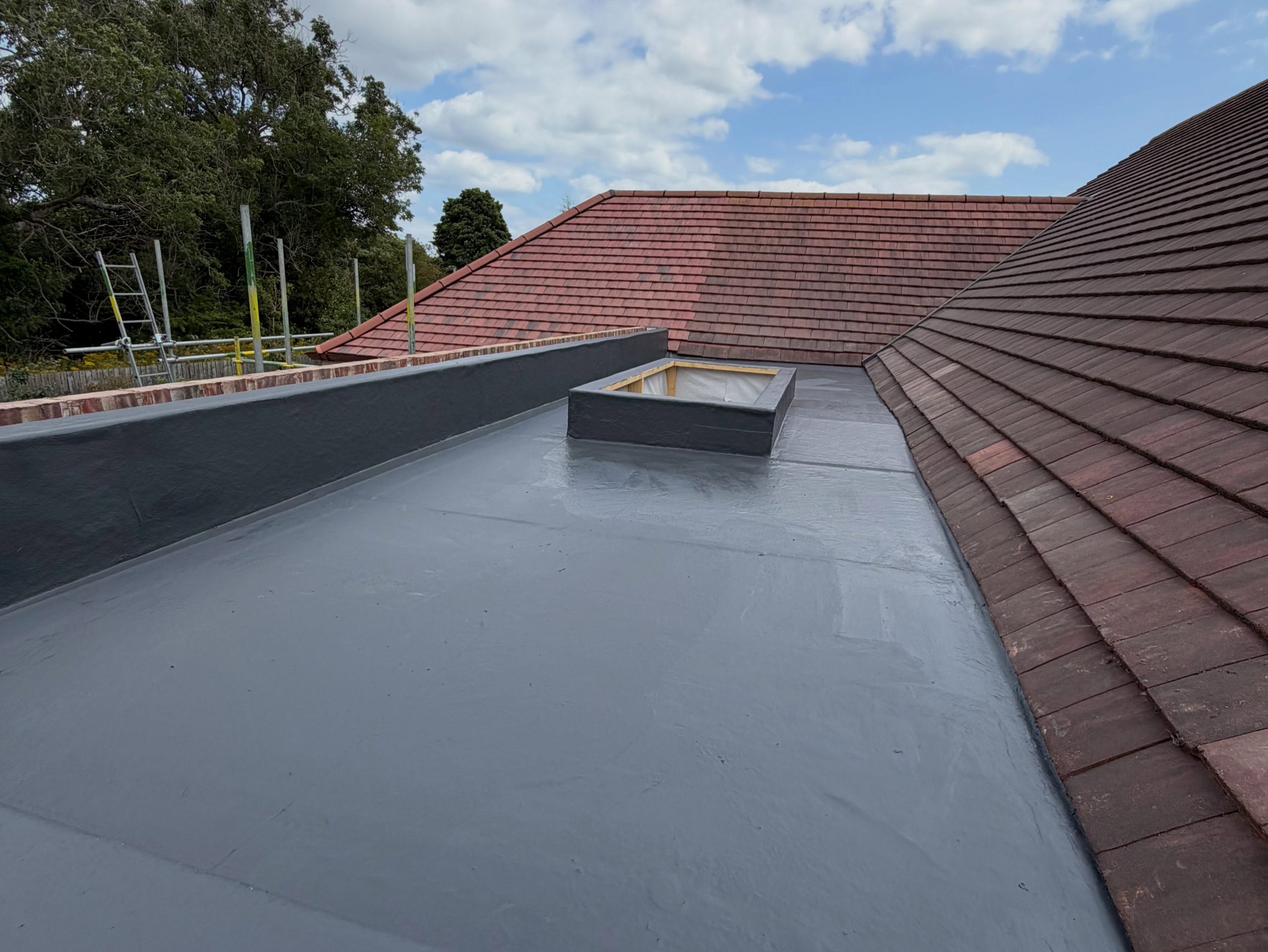 Completed flat warm roof system with roof lantern opening Completed flat warm roof system with roof lantern opening